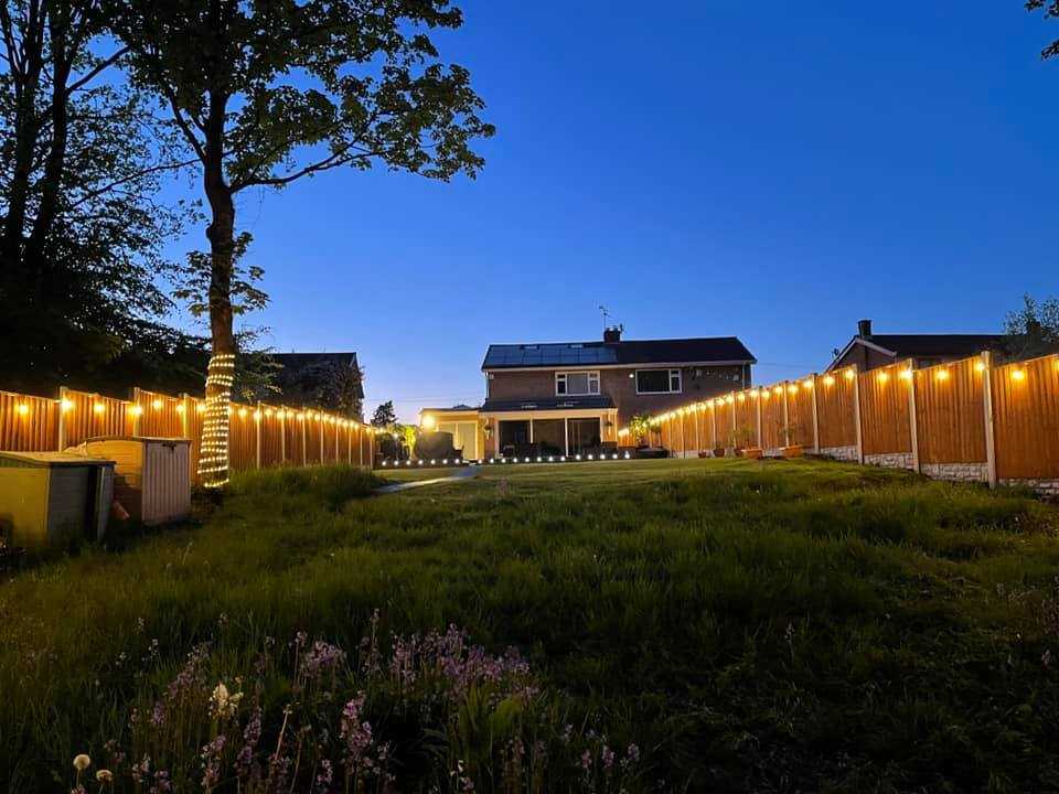 Electrician in Kirkby installing outdoor lighting